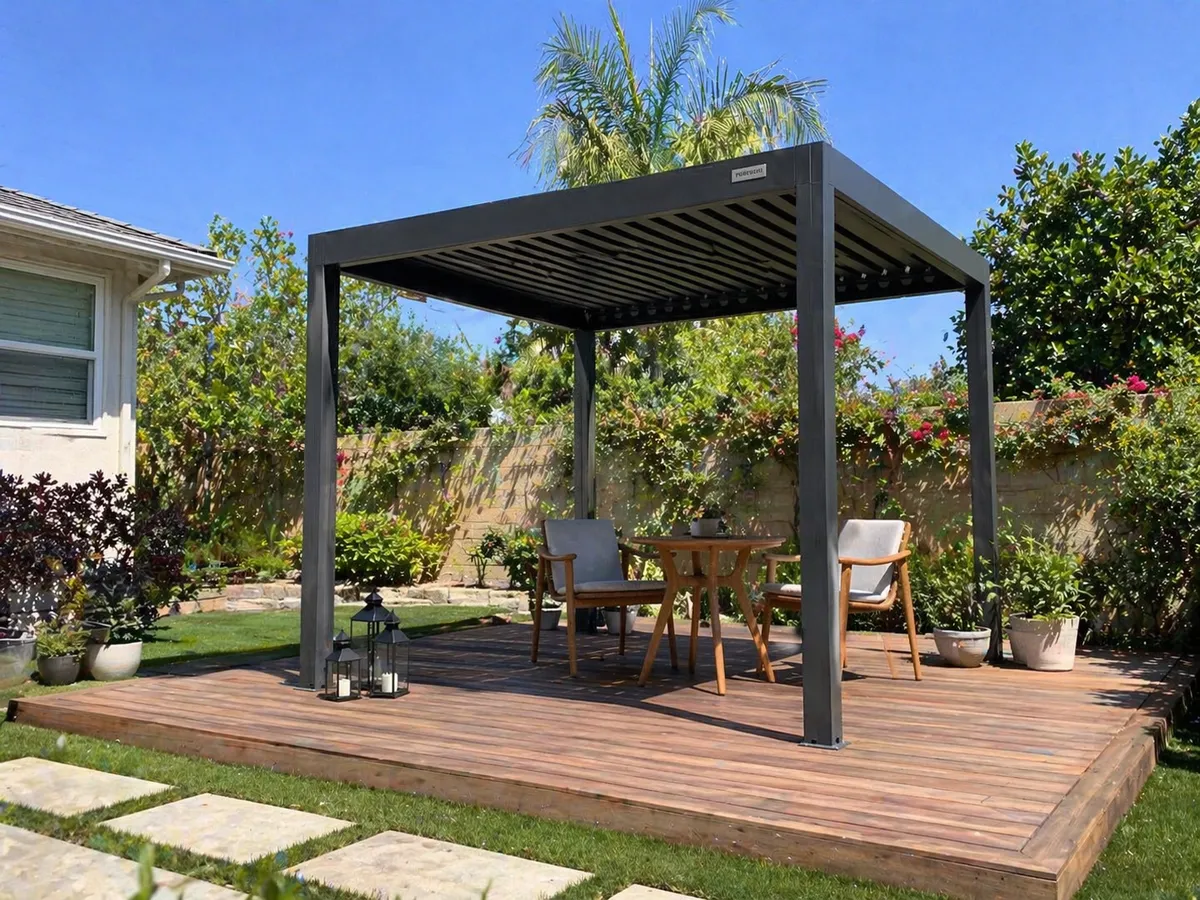 Freestanding louvered pergola on wood deck
